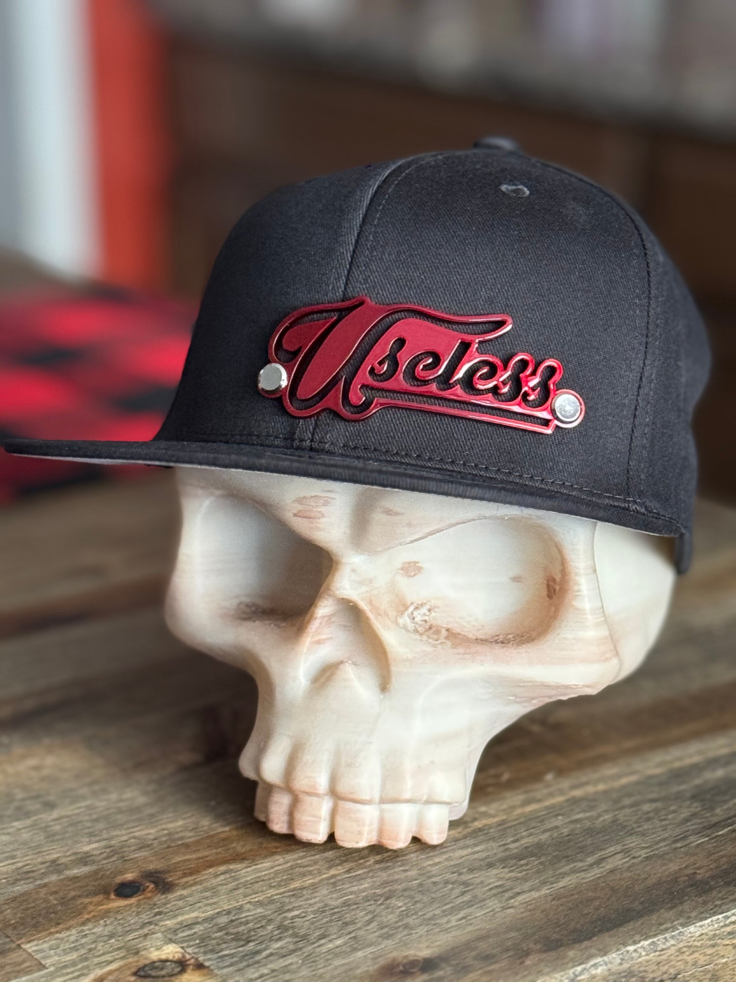 Team Useless – Metal Emblem Hat